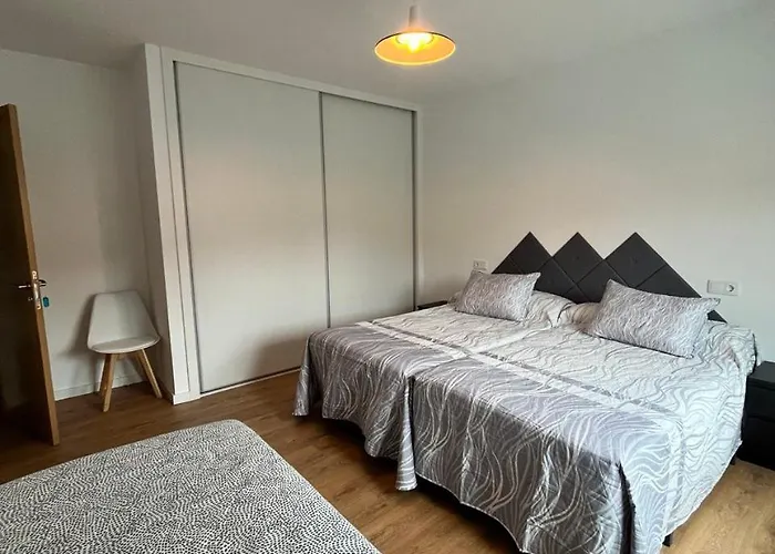 A De Carmina א-קורוניה